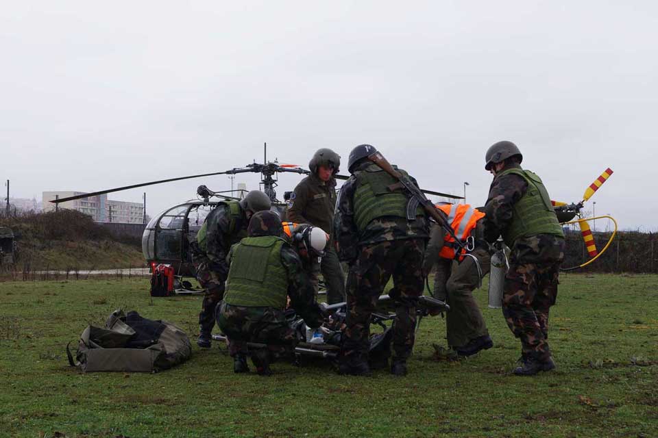 A wounded person is prepared for the air transport